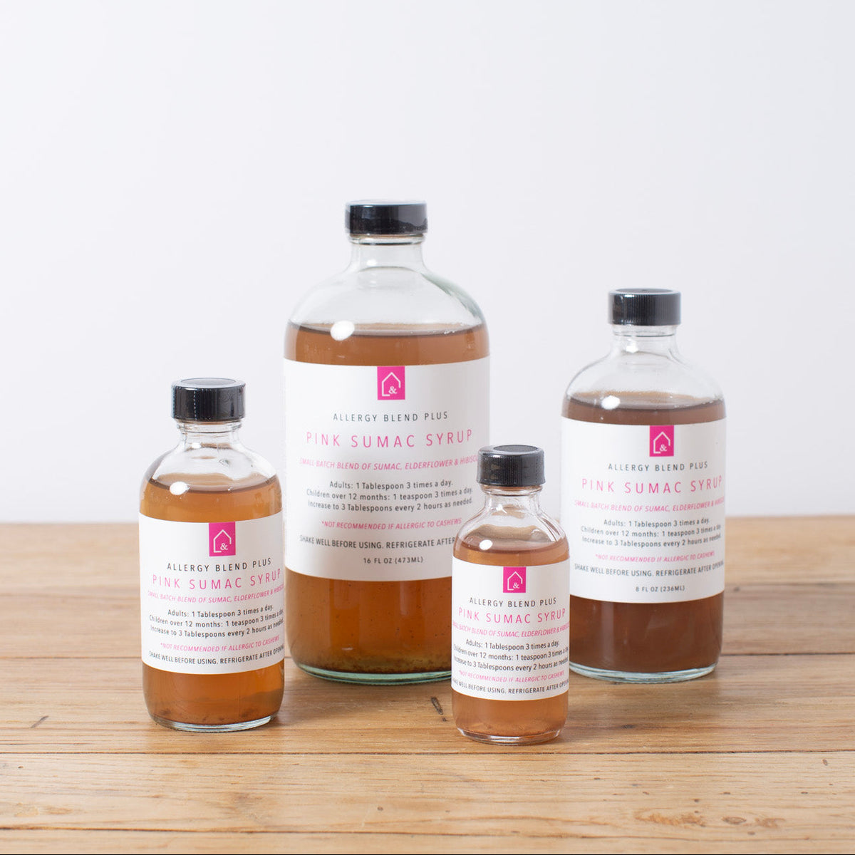 Pink Sumac Syrup bottles available in multiple sizes from The Syrup Shop